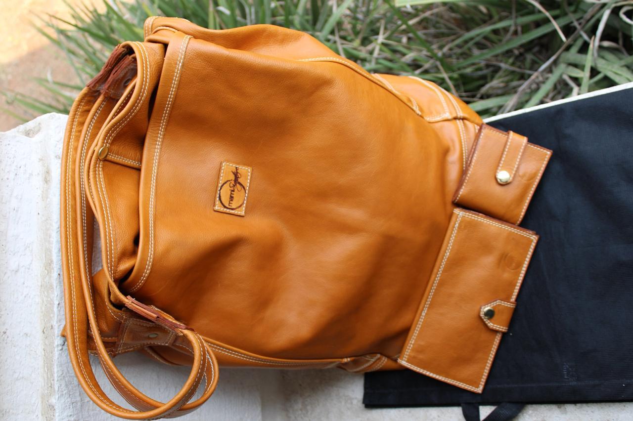 Mami Signature tan leather handbag and accessories